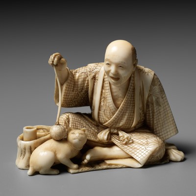Lot 277 - SEIHO: AN IVORY OKIMONO OF A MAN AND HIS CAT