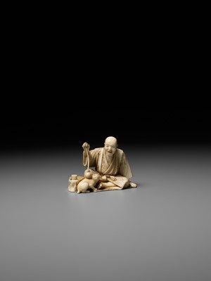 Lot 277 - SEIHO: AN IVORY OKIMONO OF A MAN AND HIS CAT