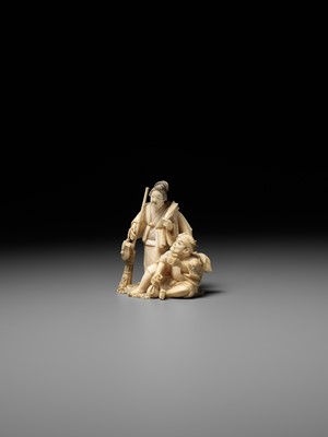 Lot 165 - KIKUMASA: A FINE IVORY OKIMONO OF A WOMAN SCOLDING A DRUNKARD