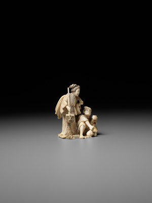 Lot 165 - KIKUMASA: A FINE IVORY OKIMONO OF A WOMAN SCOLDING A DRUNKARD