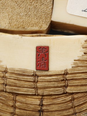Lot 276 - BISEI: AN IVORY OKIMONO DEPICTING A MILLER AT WORK