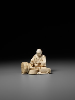 Lot 276 - BISEI: AN IVORY OKIMONO DEPICTING A MILLER AT WORK