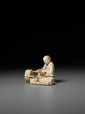 Lot 276 - BISEI: AN IVORY OKIMONO DEPICTING A MILLER AT WORK
