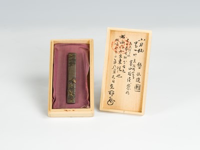 Lot 307 - HAMANO YASUYUKI: A FINE HAMANO SCHOOL SHIBUICHI KOZUKA DEPICTING KANZAN AND JITTOKU ON A MOONLIT NIGHT