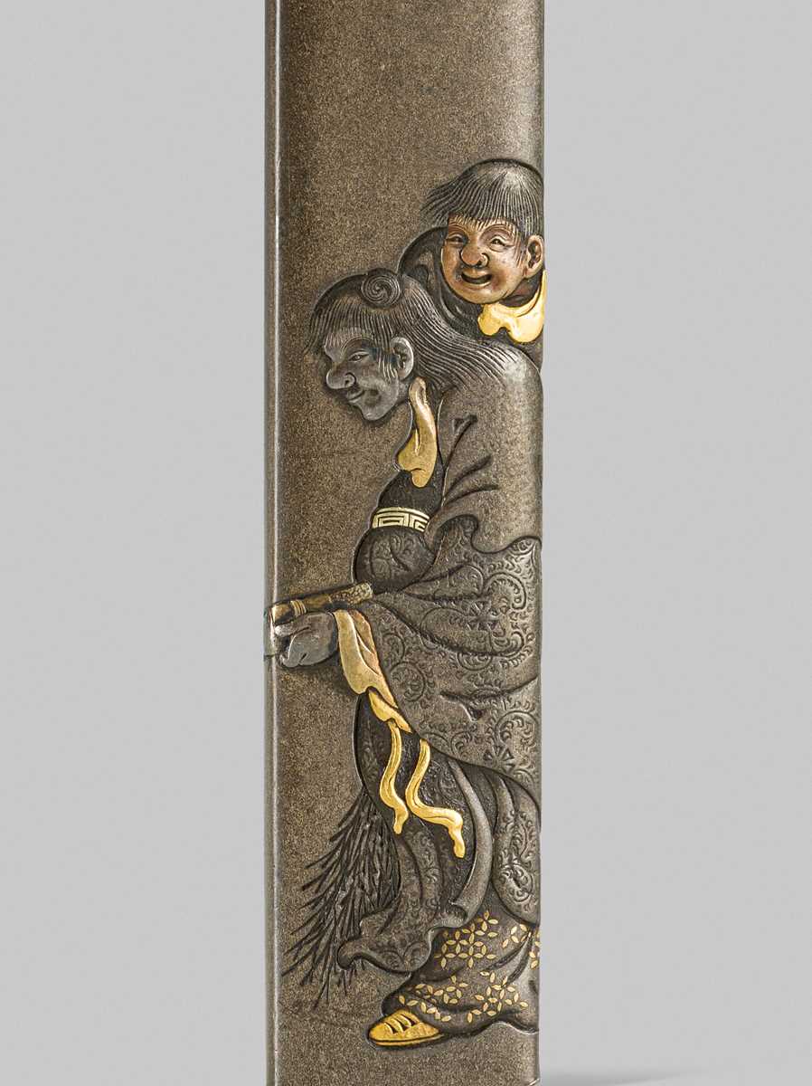 Lot 307 - HAMANO YASUYUKI: A FINE HAMANO SCHOOL SHIBUICHI KOZUKA DEPICTING KANZAN AND JITTOKU ON A MOONLIT NIGHT
