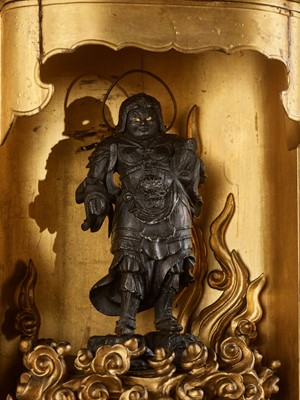 Lot 69 - A GILT AND LACQUERED WOOD ZUSHI (PORTABLE SHRINE) CONTAINING A LACQUERED WOOD FIGURE OF BISHAMONTEN, EDO