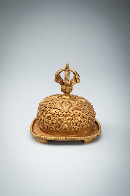 Lot 1045 - A TIBETAN GILT COPPER KAPALA, c. 1900s