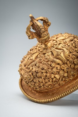 Lot 1045 - A TIBETAN GILT COPPER KAPALA, c. 1900s
