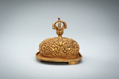 Lot 1045 - A TIBETAN GILT COPPER KAPALA, c. 1900s