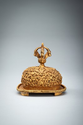 Lot 1045 - A TIBETAN GILT COPPER KAPALA, c. 1900s
