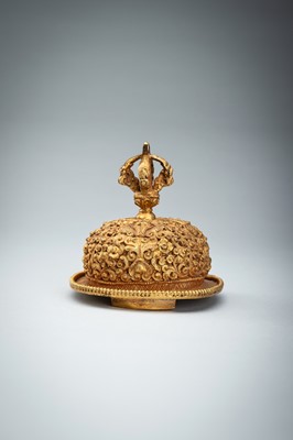 Lot 1045 - A TIBETAN GILT COPPER KAPALA, c. 1900s