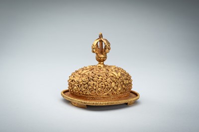 Lot 1045 - A TIBETAN GILT COPPER KAPALA, c. 1900s