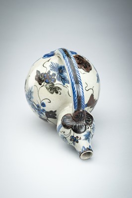 Lot 250 - A CERAMIC POURING VESSEL DEPICTING GRAPEVINES, KENDI