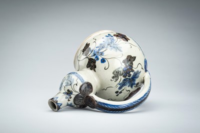 Lot 250 - A CERAMIC POURING VESSEL DEPICTING GRAPEVINES, KENDI