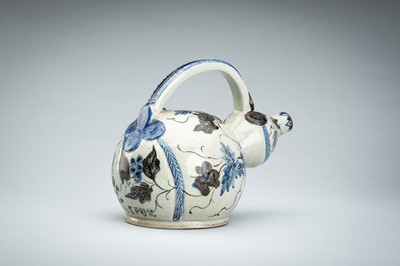 Lot 250 - A CERAMIC POURING VESSEL DEPICTING GRAPEVINES, KENDI