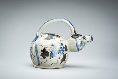 Lot 250 - A CERAMIC POURING VESSEL DEPICTING GRAPEVINES, KENDI