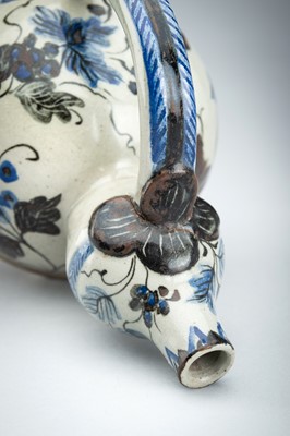 Lot 250 - A CERAMIC POURING VESSEL DEPICTING GRAPEVINES, KENDI