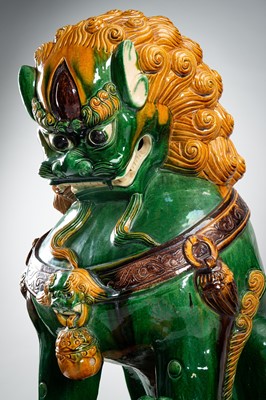 Lot 88 - A VERY LARGE SANCAI-GLAZED PAIR OF BUDDHIST LIONS, QING