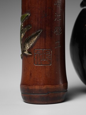 Lot 200 - MINKO: A SUPERB EBONY PUMPKIN-FORM TONKOTSU AND INLAID BAMBOO KISERUZUTSU WITH SNAIL AND BAMBOO