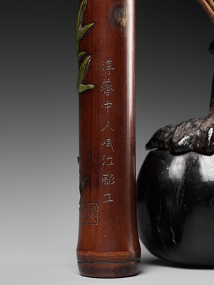Lot 200 - MINKO: A SUPERB EBONY PUMPKIN-FORM TONKOTSU AND INLAID BAMBOO KISERUZUTSU WITH SNAIL AND BAMBOO
