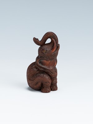Lot 420 - VADYM PYVOVAR: A BOXWOOD NETSUKE OF AN ELEPHANT, AFTER KOKEISAI SANSHO