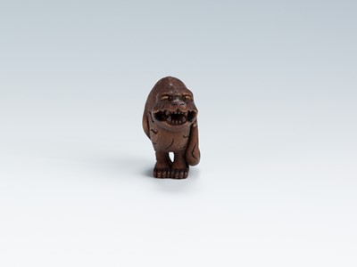 Lot 419 - VADYM PYVOVAR: A BOXWOOD NETSUKE OF A SNARLING TIGER