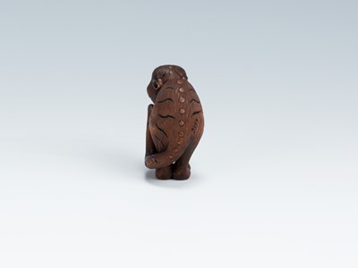 Lot 419 - VADYM PYVOVAR: A BOXWOOD NETSUKE OF A SNARLING TIGER