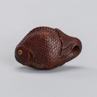 Lot 698 - VADYM PYVOVAR: A BOXWOOD NETSUKE OF A CARP