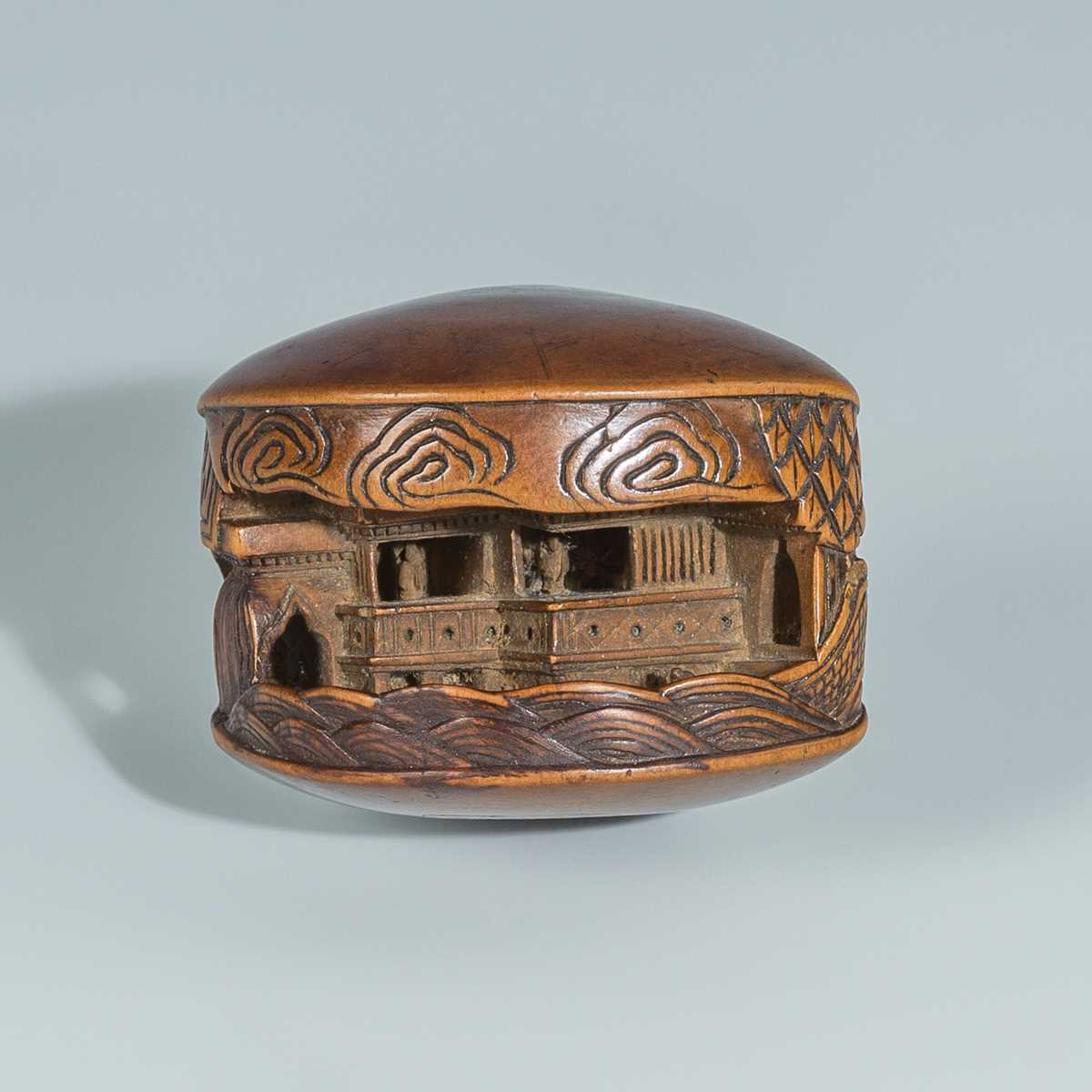 Lot 387 - MITSUNOBU: A WOOD NETSUKE OF THE CLAM’S DREAM