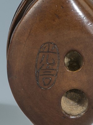 Lot 387 - MITSUNOBU: A WOOD NETSUKE OF THE CLAM’S DREAM
