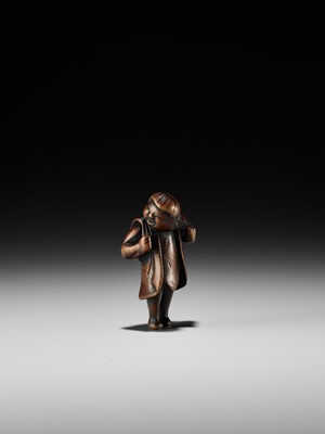 Lot 187 - A RARE WOOD NETSUKE DEPICTING A KARAKO BOY DURING SHICHI-GO-SAN