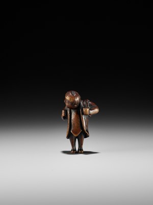 Lot 187 - A RARE WOOD NETSUKE DEPICTING A KARAKO BOY DURING SHICHI-GO-SAN