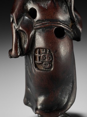 Lot 194 - A WOOD NETSUKE OF GAMA SENNIN WITH TOAD