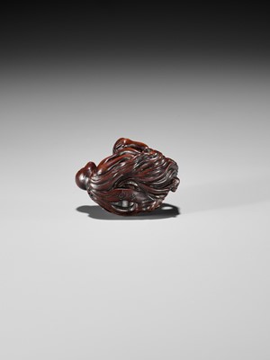 Lot 370 - KOKEI: A FINE WOOD NETSUKE OF AMA STRUGGLING WITH AN OCTOPUS