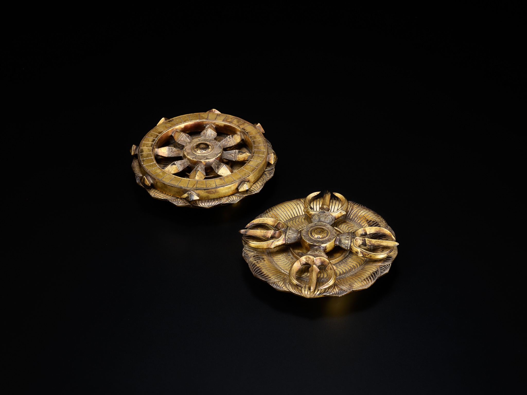 Lot 32 - A PAIR OF GILT BRONZE BUDDHIST RITUAL OBJECTS,