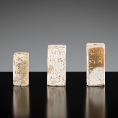 Lot 435 - A SET OF THREE INSCRIBED JADE RECTANGULAR BEADS, GANGMAO, EASTERN HAN DYNASTY