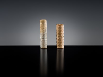 Lot 145 - A GROUP OF TWO ARCHAIC JADE BEADS, EASTERN ZHOU DYNASTY