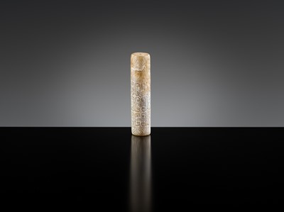 Lot 145 - A GROUP OF TWO ARCHAIC JADE BEADS, EASTERN ZHOU DYNASTY