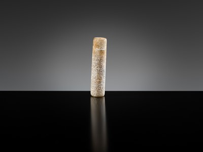 Lot 145 - A GROUP OF TWO ARCHAIC JADE BEADS, EASTERN ZHOU DYNASTY