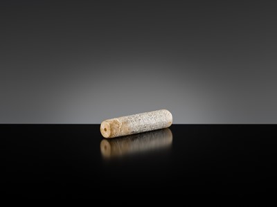 Lot 145 - A GROUP OF TWO ARCHAIC JADE BEADS, EASTERN ZHOU DYNASTY