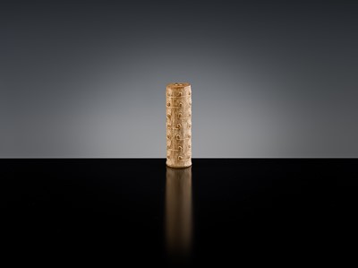 Lot 145 - A GROUP OF TWO ARCHAIC JADE BEADS, EASTERN ZHOU DYNASTY