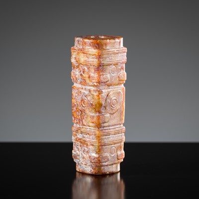 Lot 415 - A RARE SMALL ARCHAIC CELADON JADE THREE-TIERED CONG-FORM BEAD, LIANGZHU CULTURE