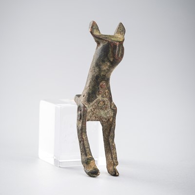 Lot 1671 - A BRONZE FRAGMENT OF AN ANIMAL, LURISTAN, IRAN, CIRCA 1000-650 BC