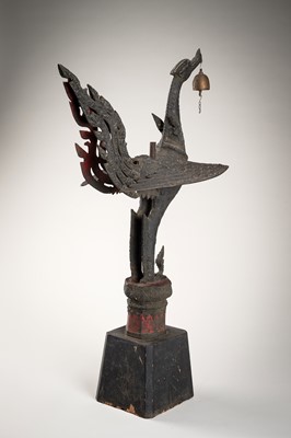A LARGE BRONZE PHOENIX WITH BELL AND CANDLESTICK