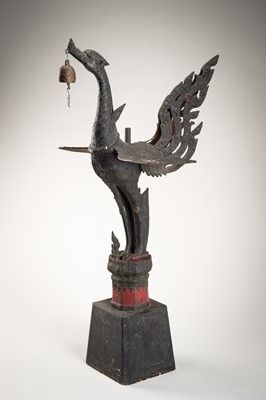A LARGE BRONZE PHOENIX WITH BELL AND CANDLESTICK
