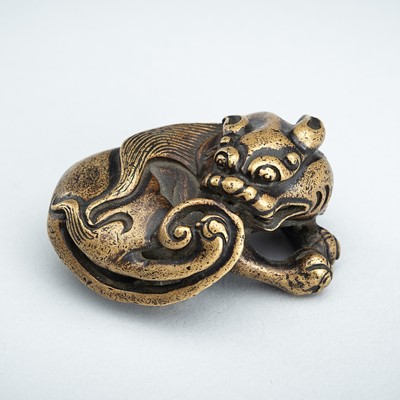 Lot 1006 - A BRONZE ‘LION’ WEIGHT, MING DYNASTY