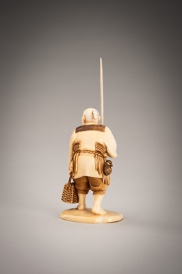 Lot 290 - A FINE IVORY OKIMONO OF A FISHERMAN