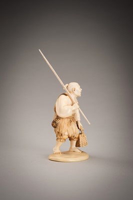 Lot 290 - A FINE IVORY OKIMONO OF A FISHERMAN