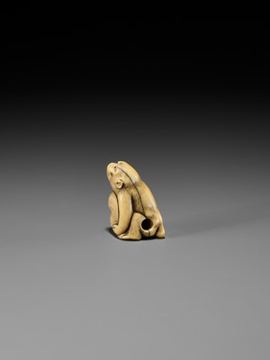 Lot 189 - A FINE OSAKA SCHOOL IVORY NETSUKE OF A MONKEY WITH A SARU MASK