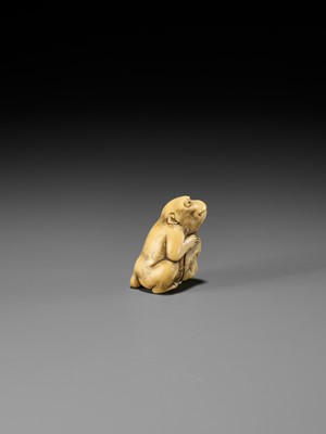 Lot 189 - A FINE OSAKA SCHOOL IVORY NETSUKE OF A MONKEY WITH A SARU MASK